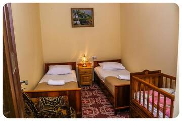Двухместный номер с 2 отдельными кроватями в Гостевом доме Hayi Tun Guest House